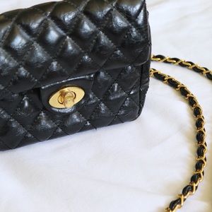 Quilted purse with gold hardware